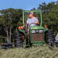 Raking hay Scurlock Farms Vacation Rentals Georgetown TX (Austin) baling hay time at Scurlock Farms Vacation Rentals Georgetown TX (Austin)